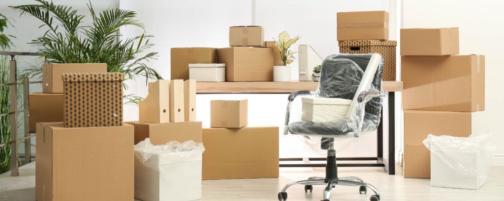 An image of wood, plastic and cardboard storage boxes