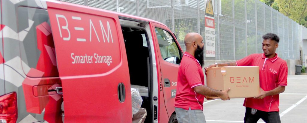 BEAM staff unloading items from the van or a staff picture