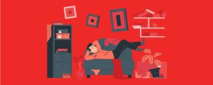 Student hanging out in a small/cluttered dorm