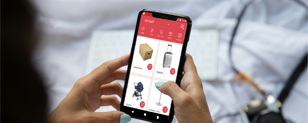 Someone looking at their stored items on their phone via the BEAM App
