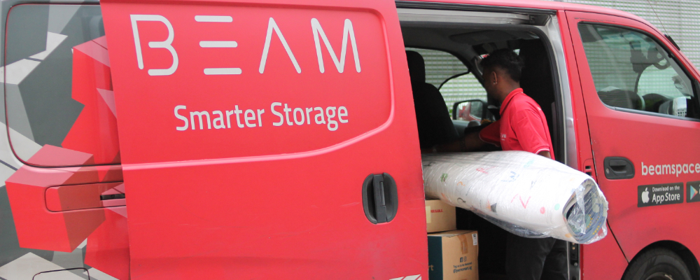 BEAM-employee-loading-item-into-BEAM-van